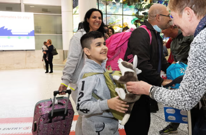 Syrian family at airport - csp visa